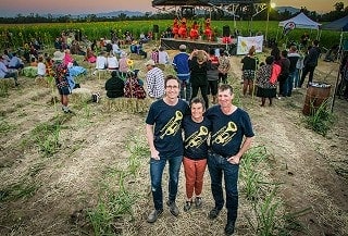 Kim Williams and Lucas Ihlein with Simon Mattsson and Kim Kleidon and community collaborators, Sunset Symphony in the Sunflowers, Mackay, Queensland, 2017